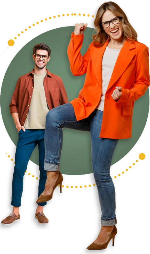 Core-Image-Comp-480px-no-data a woman in the foreground wearing an orange blazer and professional attire has one leg up and an arm down expressing joy. A man in the background is wearing business-casual attire has his hands in his pockets.